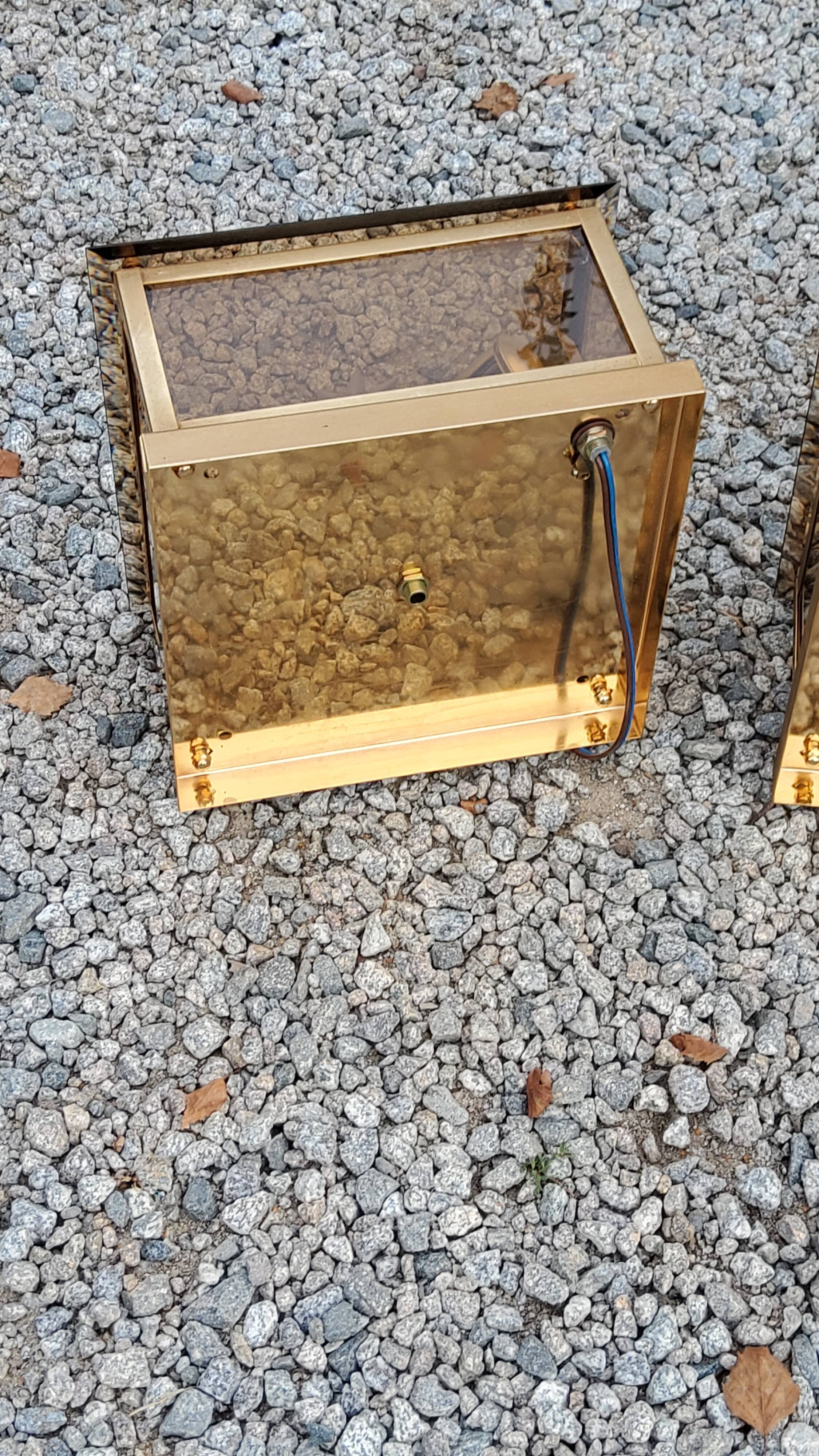 Pair of wall lamps in smoked glass and gilded metal from the 70s/80s