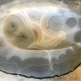 Empty pockets in agate