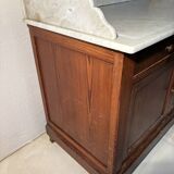 Antique wood and marble kitchen sideboard with carved backsplash