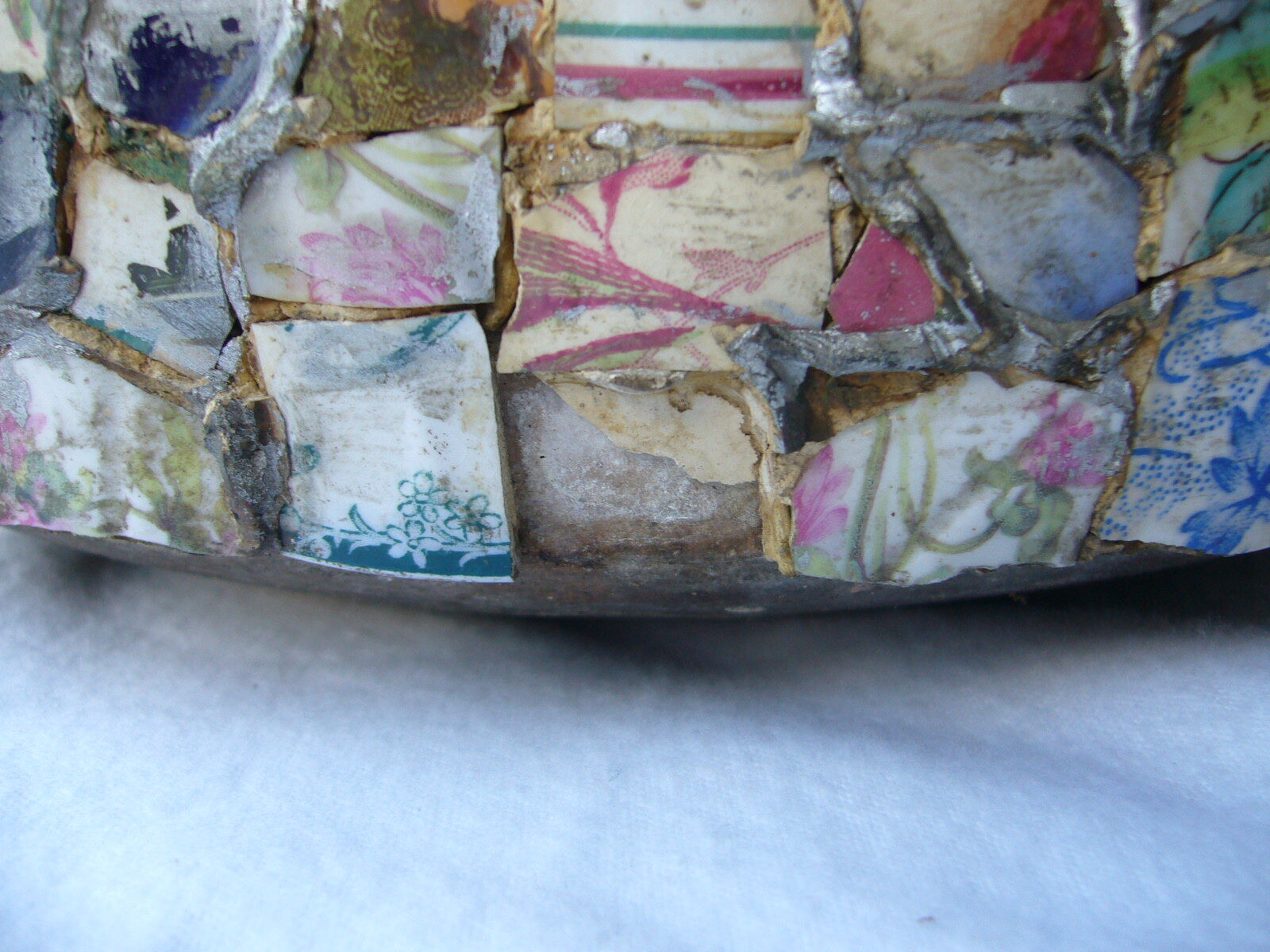 Earth pot and ancient mosaic cache