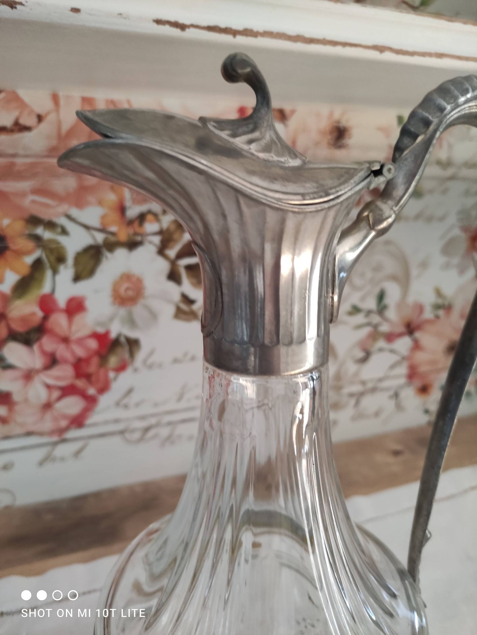 Old water decanter in curved glass and tin Art Nouveau style