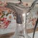 Old water decanter in curved glass and tin Art Nouveau style