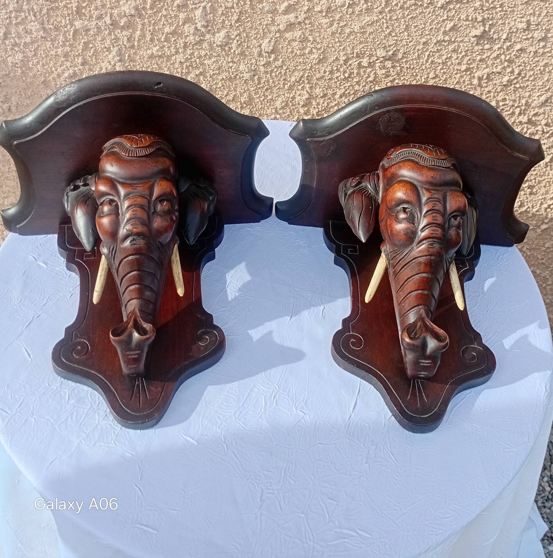 Rare pair of wall-mounted consoles Elephant carved wood J. Derolland