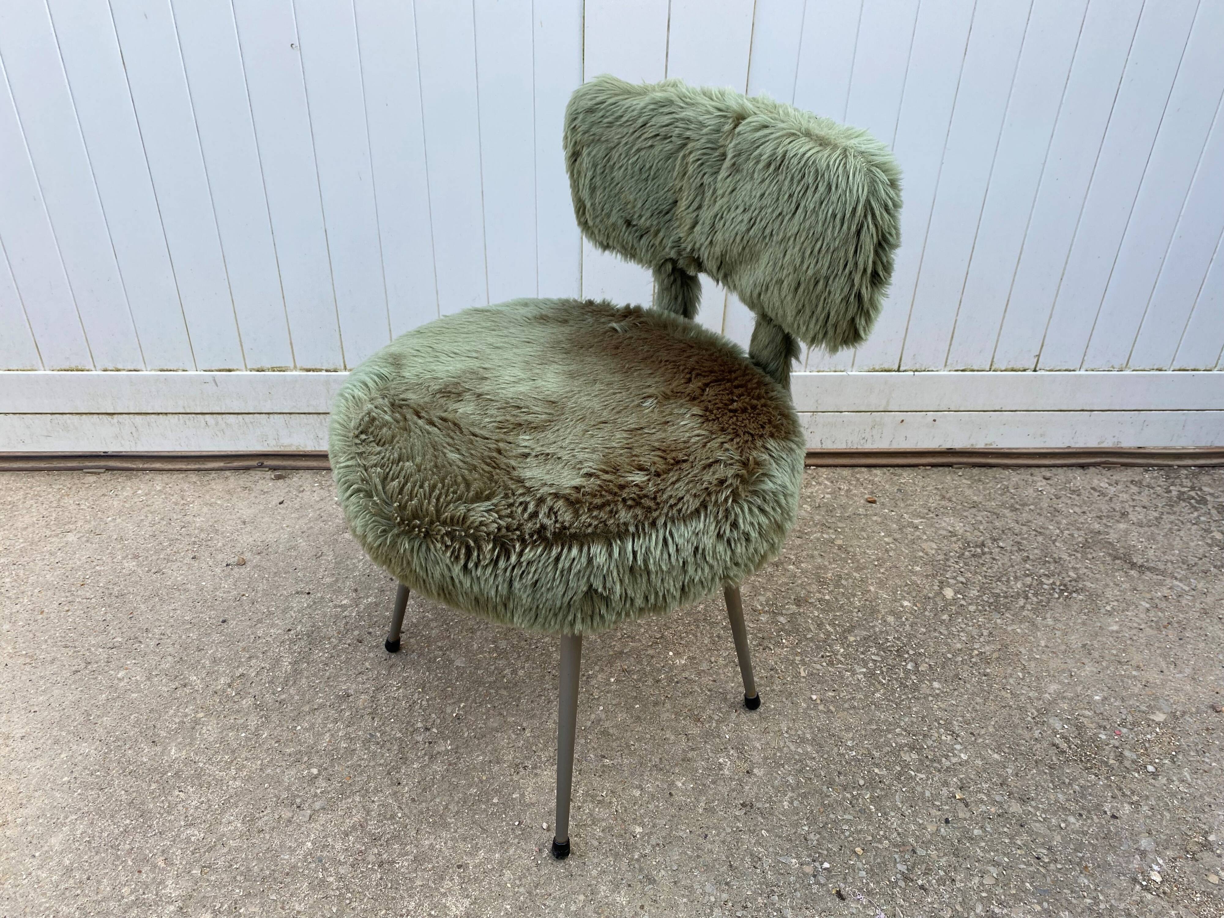 Vintage green furry chair from the 1960s