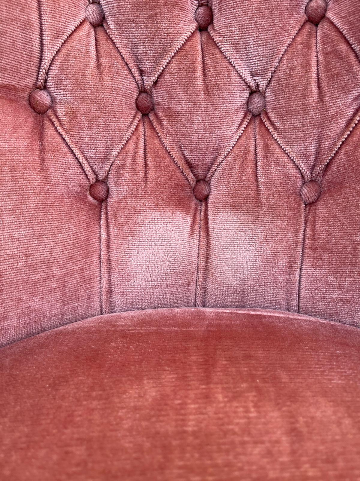 Upholstered velvet armchair
