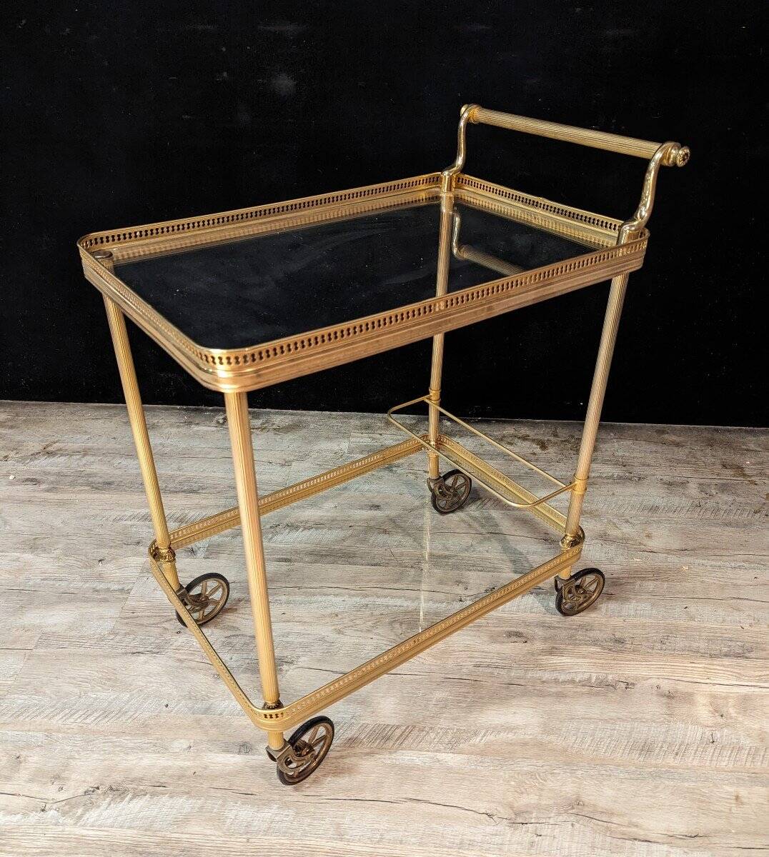 1970s serving trolley in brass and gilded bronze.