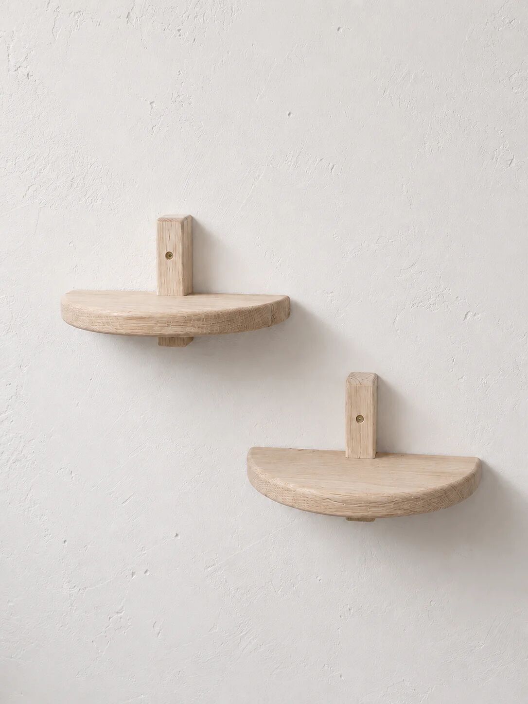 Pair of half-moon wall shelves in solid oak