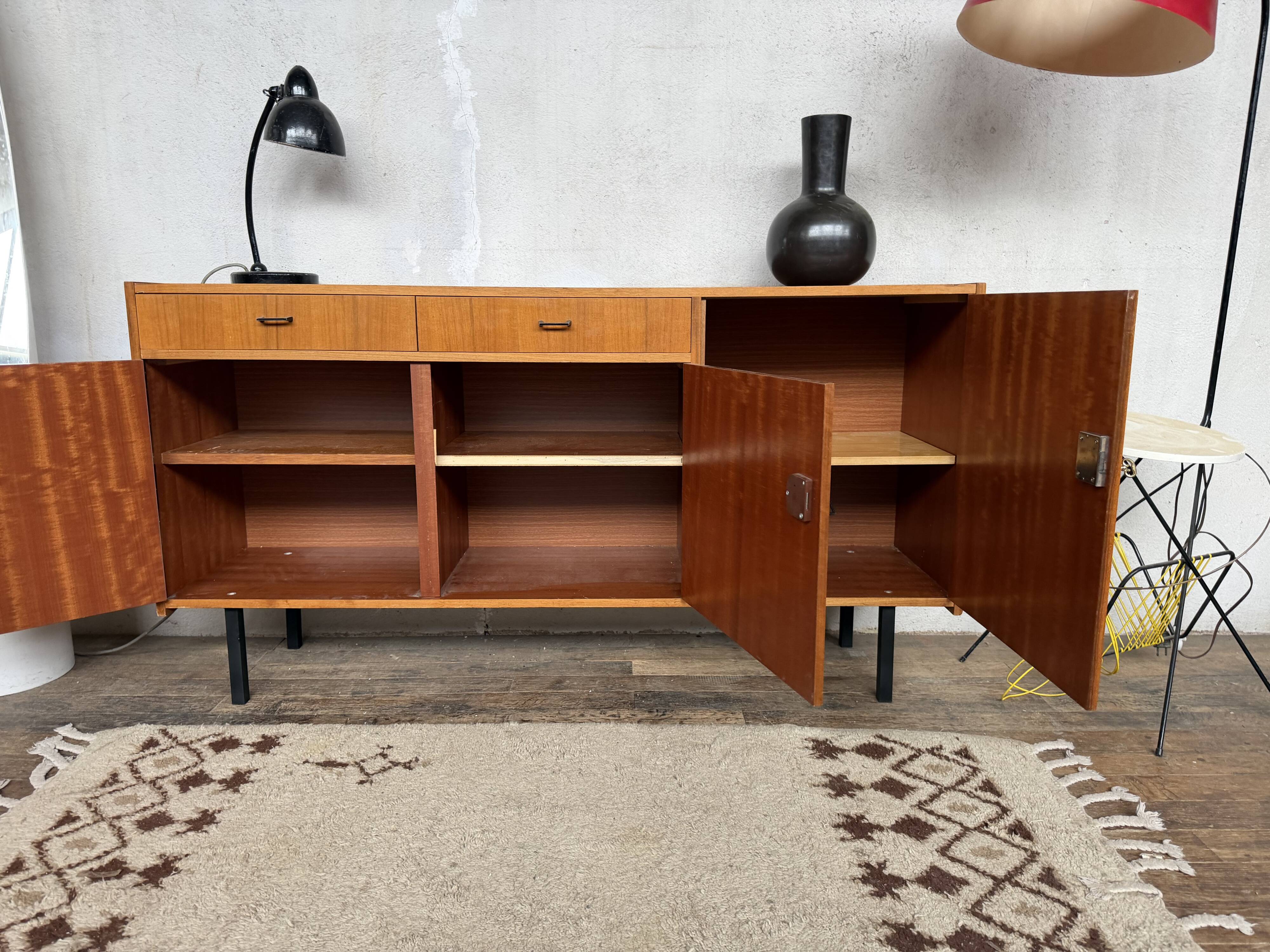 Vintage Scandinavian enfilade with metal legs.