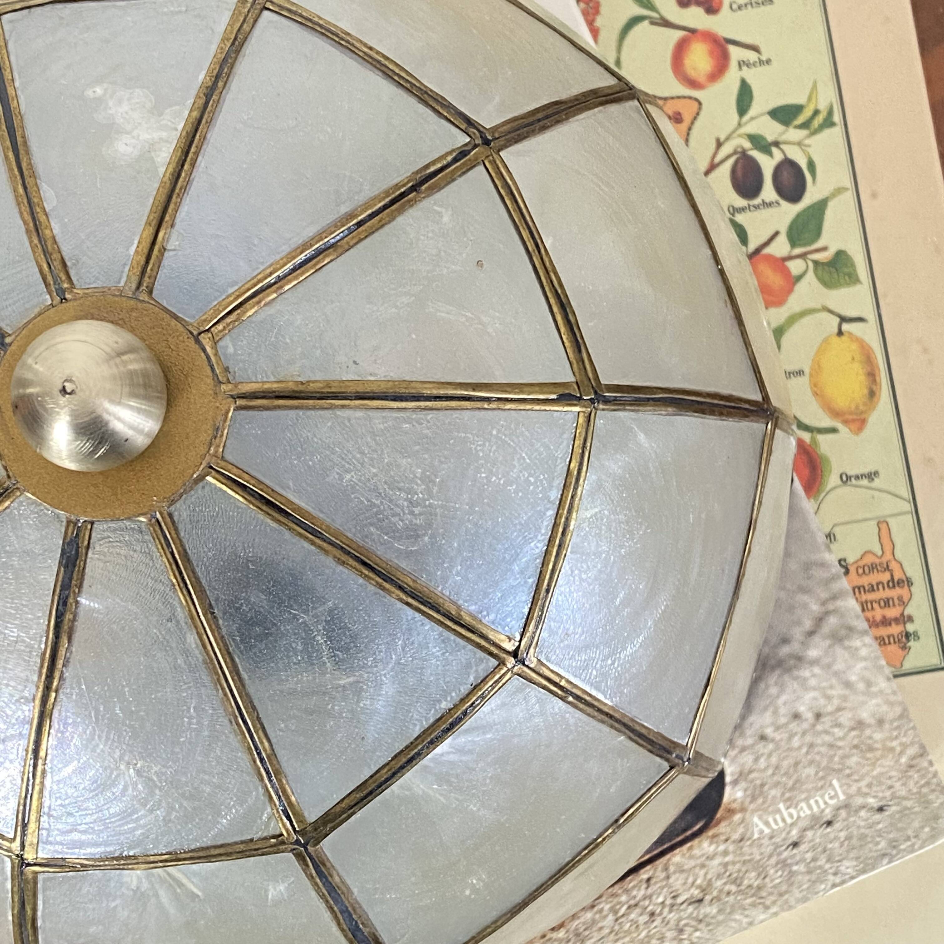 Small ceiling light with a mother-of-pearl shade from the 1950s.