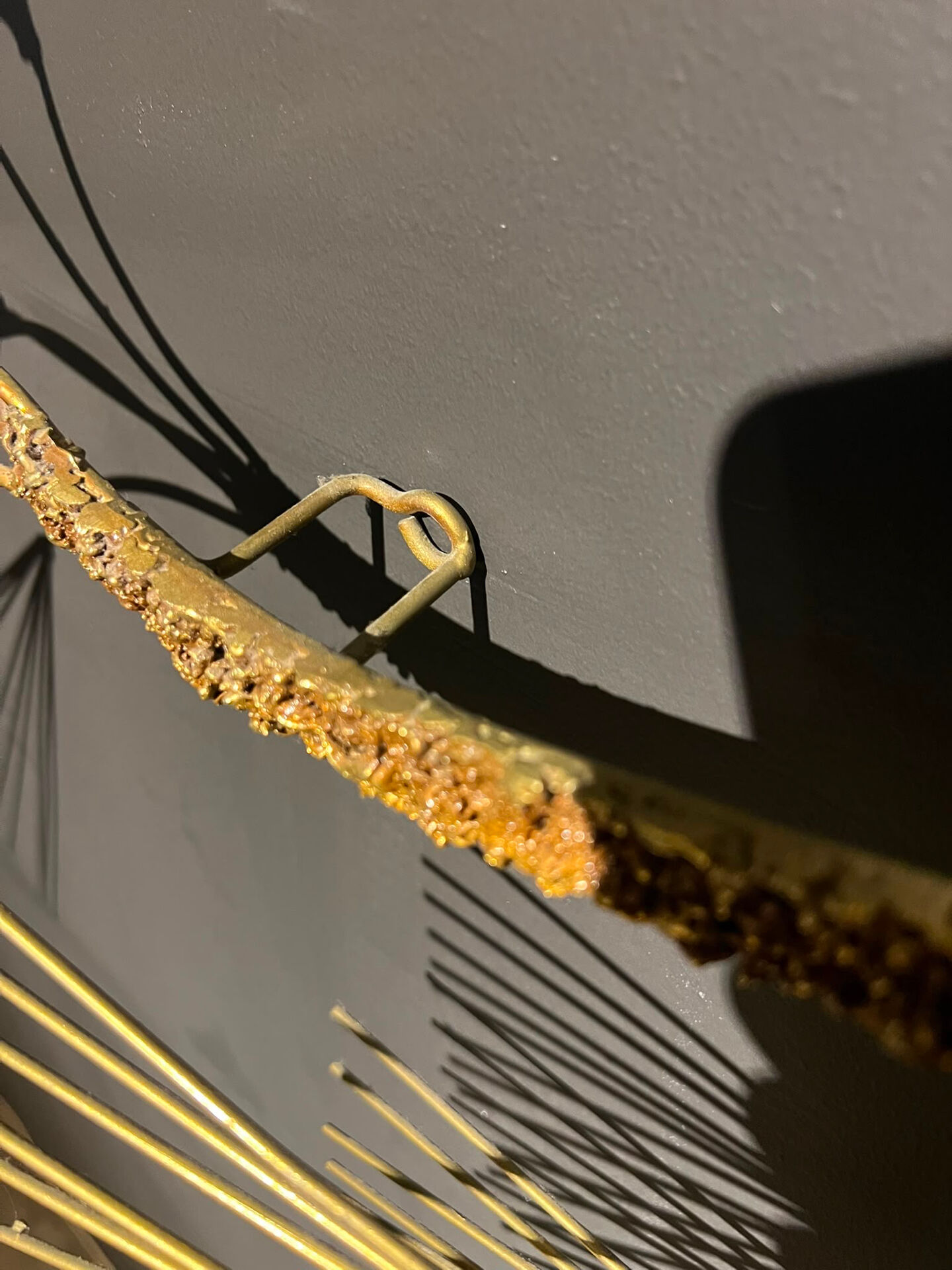 Large wall sculpture in the shape of a tree needle in brass by Curtis Jeré, mid-century modern.