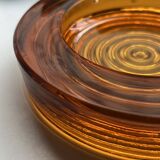 Amber pressed glass ashtray, 1970s design.
