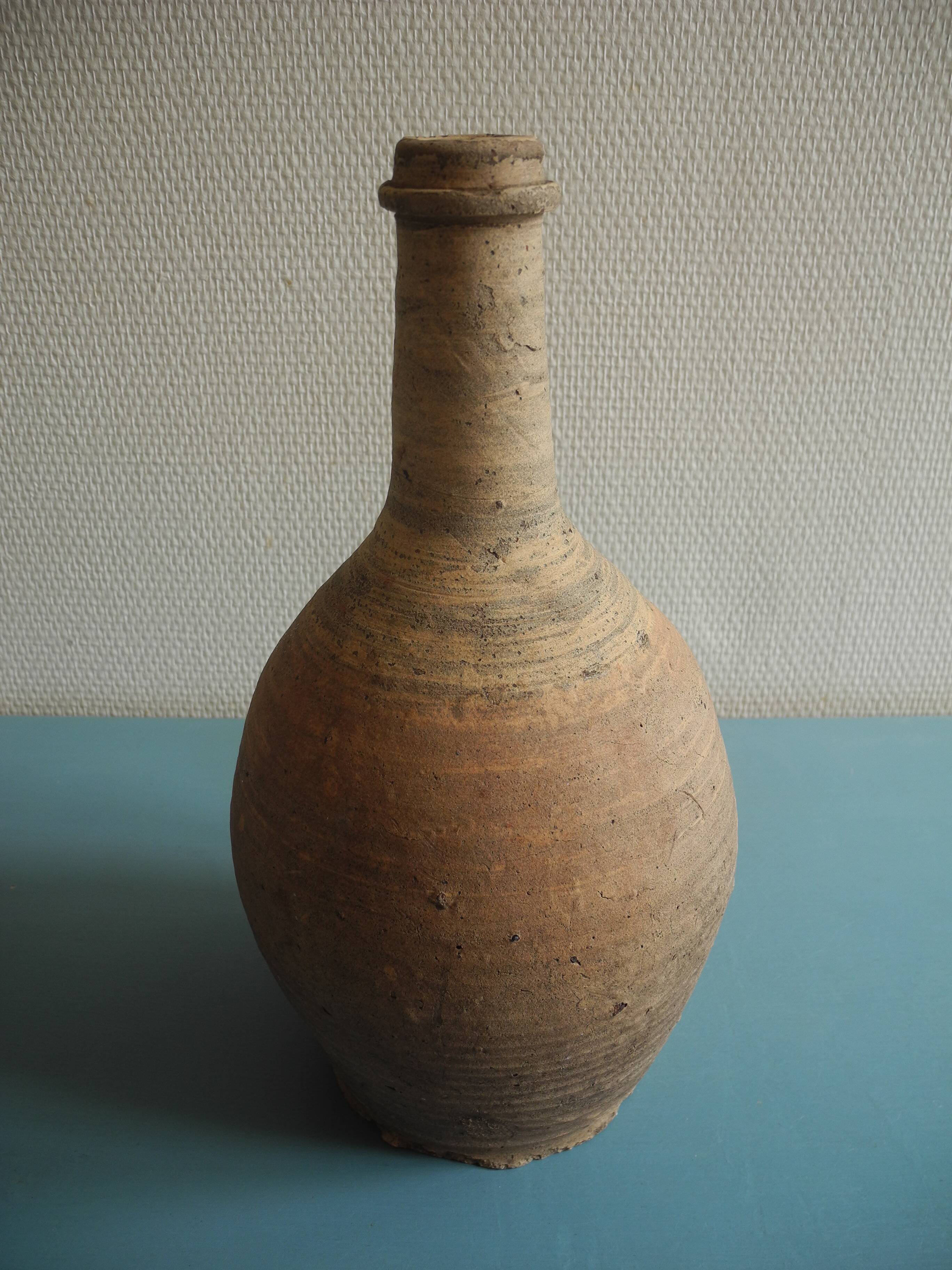 antique rustic decorative terracotta pottery bottle