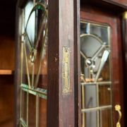 Large Empire-style display cabinet in mahogany from the late 19th century.