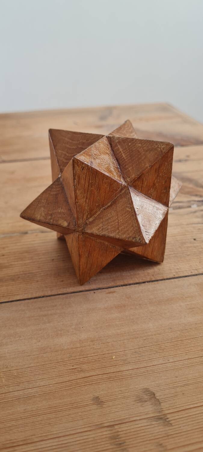 Sacndianve teak paperweight