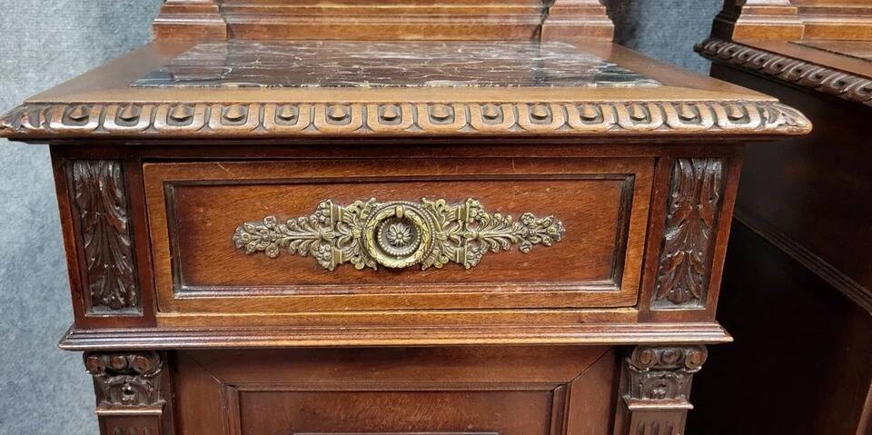 Pair of Renaissance style bedside tables in carved walnut, 19th century