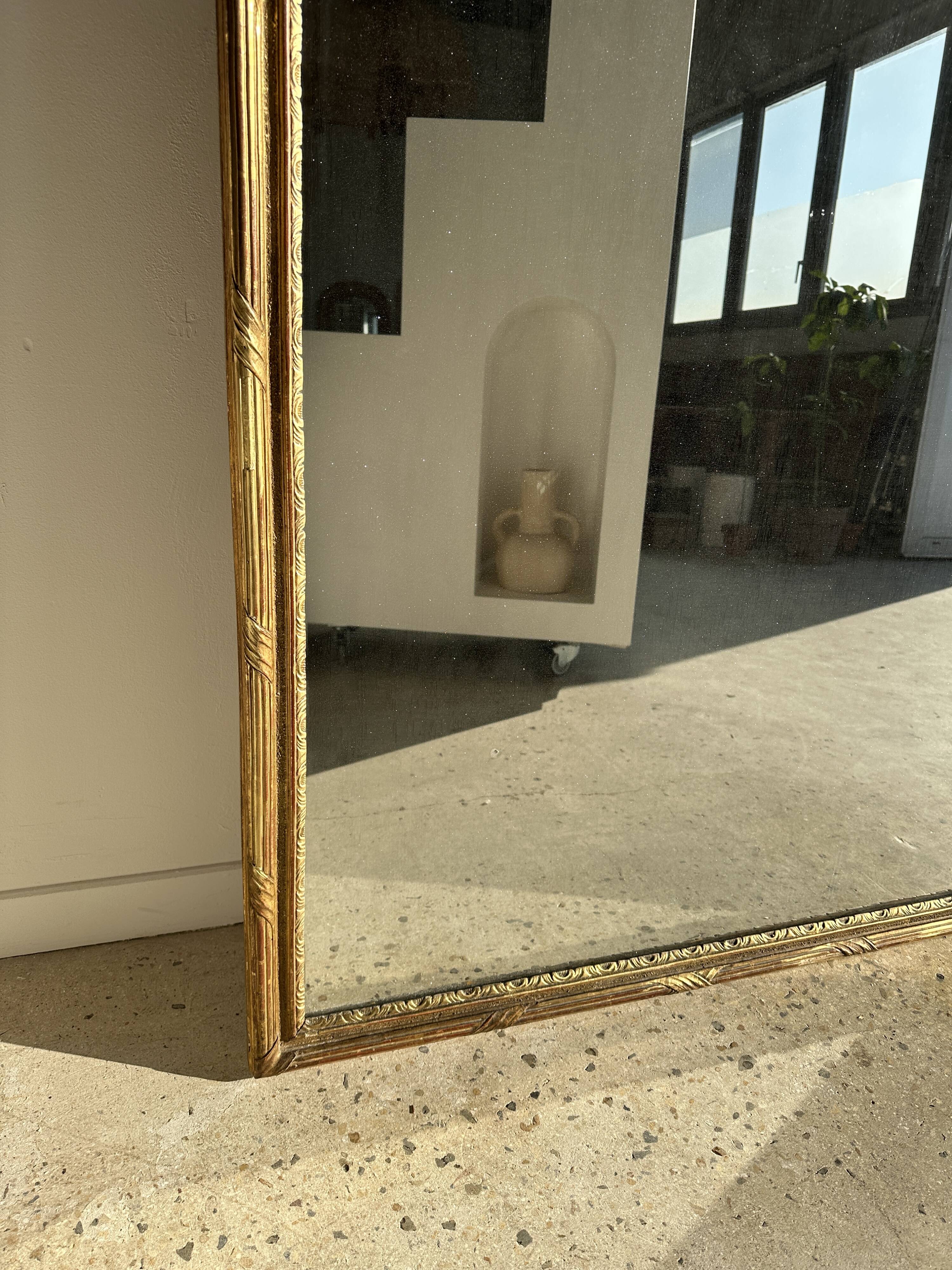 Large gilded mirror 19th century rounded corners mercury glass Louis XVI style
