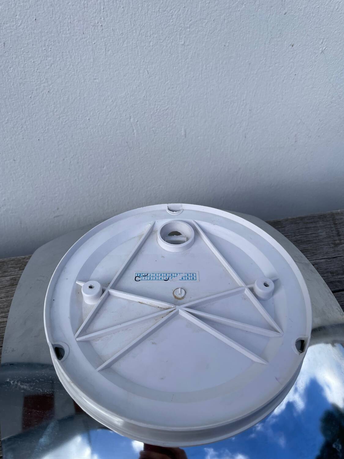 White glass and stainless steel ceiling light