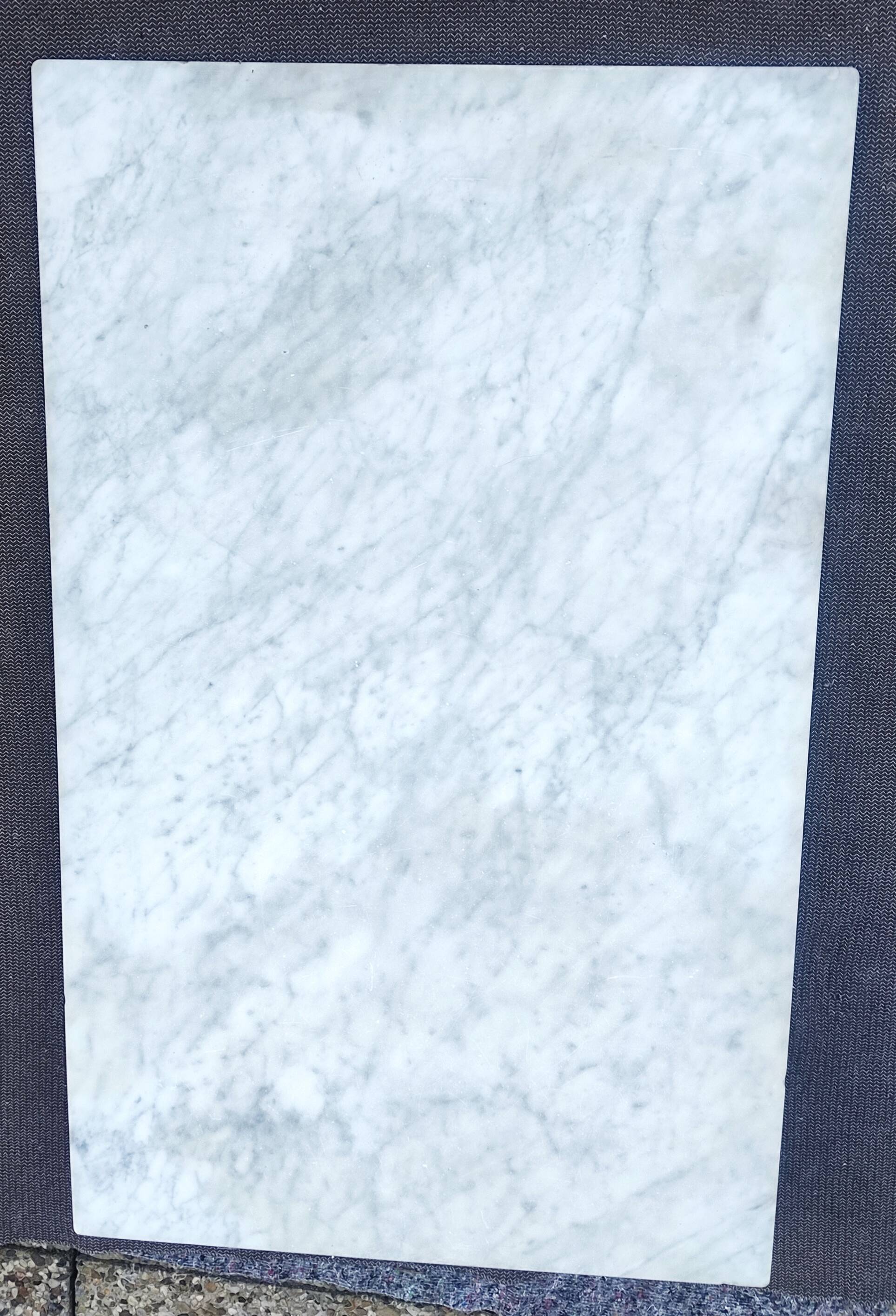 White marble table, cast iron base signed SNES, made in France