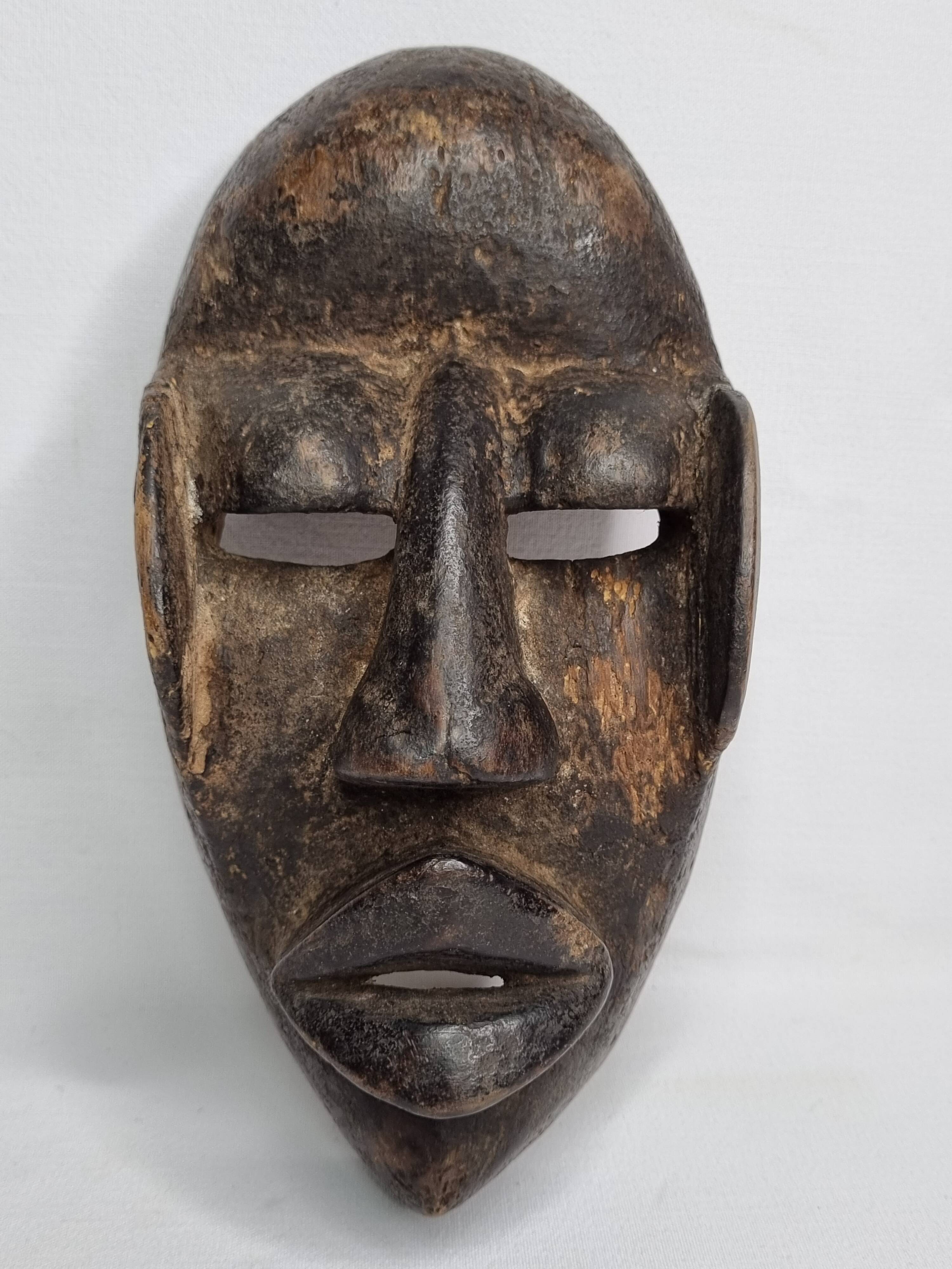 Dan Mask - Ivory Coast - Mid-20th century - Carved wood, 24 cm