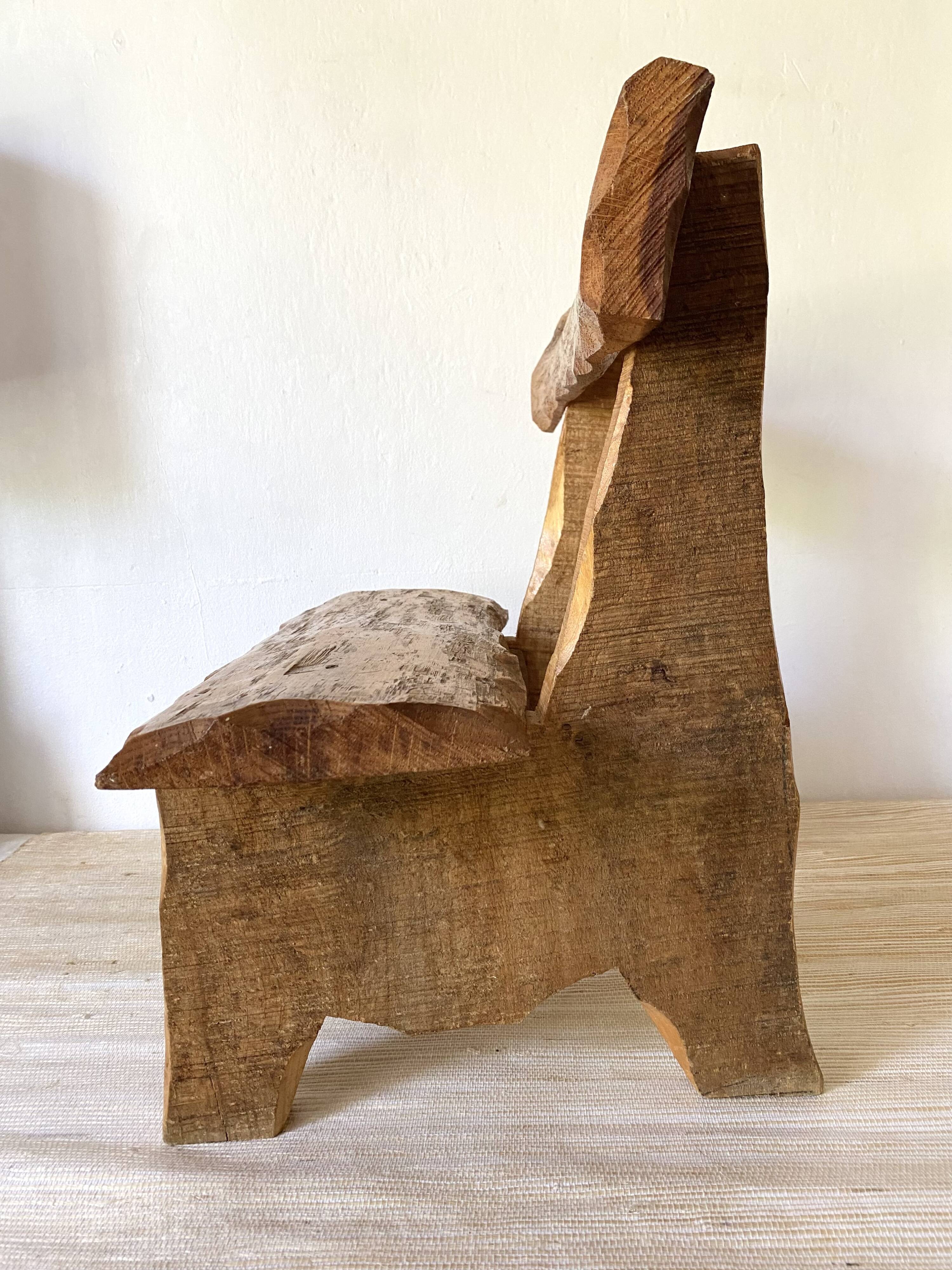 Brutalist low chair in solid wood