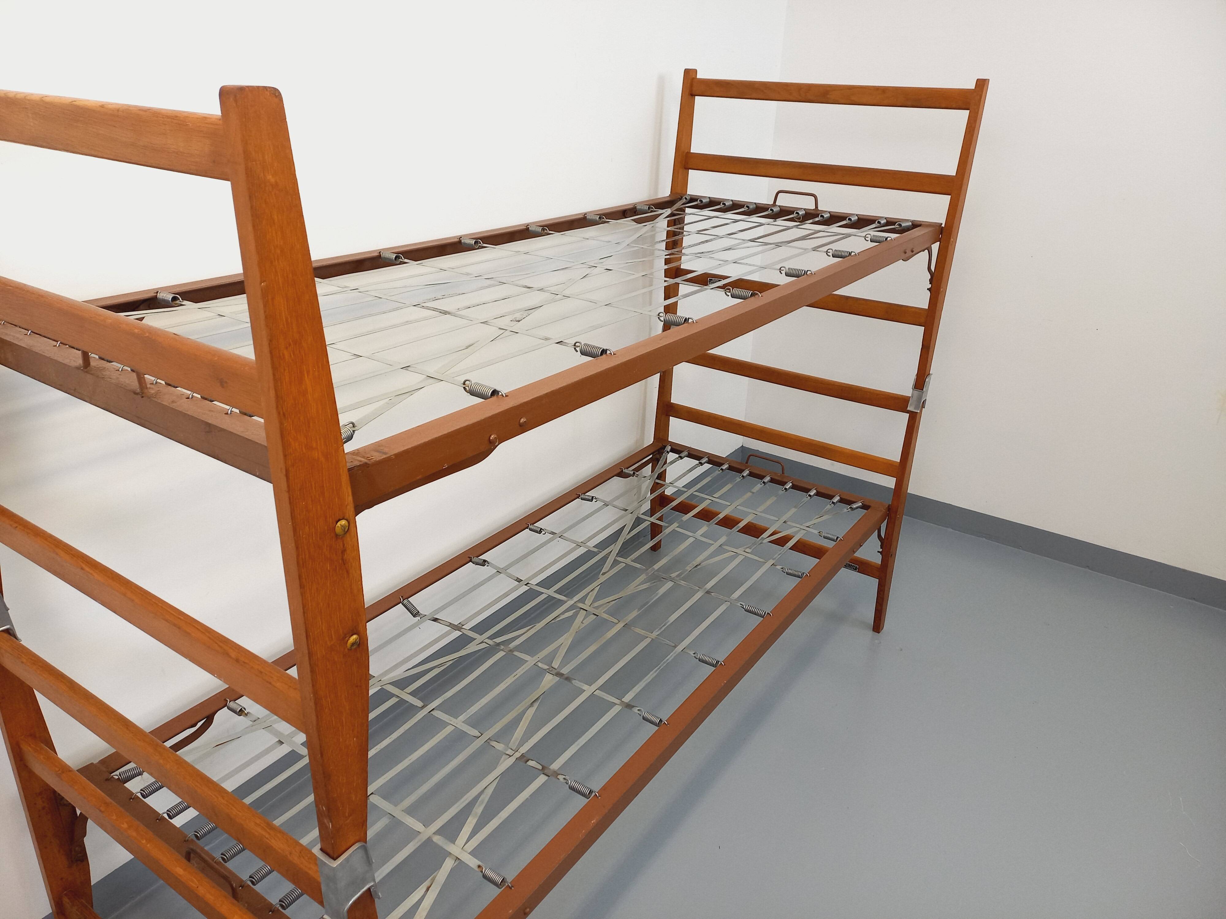 Pair of vintage stackable daybeds in oak wood and metal from the 60s
