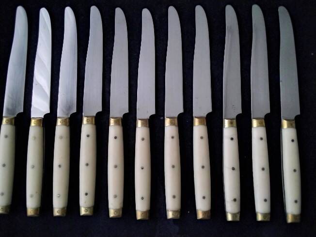 10 Vintage Bakelite, brass and stainless steel cheese knives