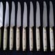 10 Vintage Bakelite, brass and stainless steel cheese knives