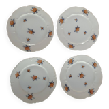 set of 4 dessert plates in white Limoges porcelain with flowers, the edge of one is different