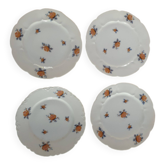 set of 4 dessert plates in white Limoges porcelain with flowers, the edge of one is different