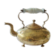 Victorian tripod kettle made of brass with a porcelain handle.