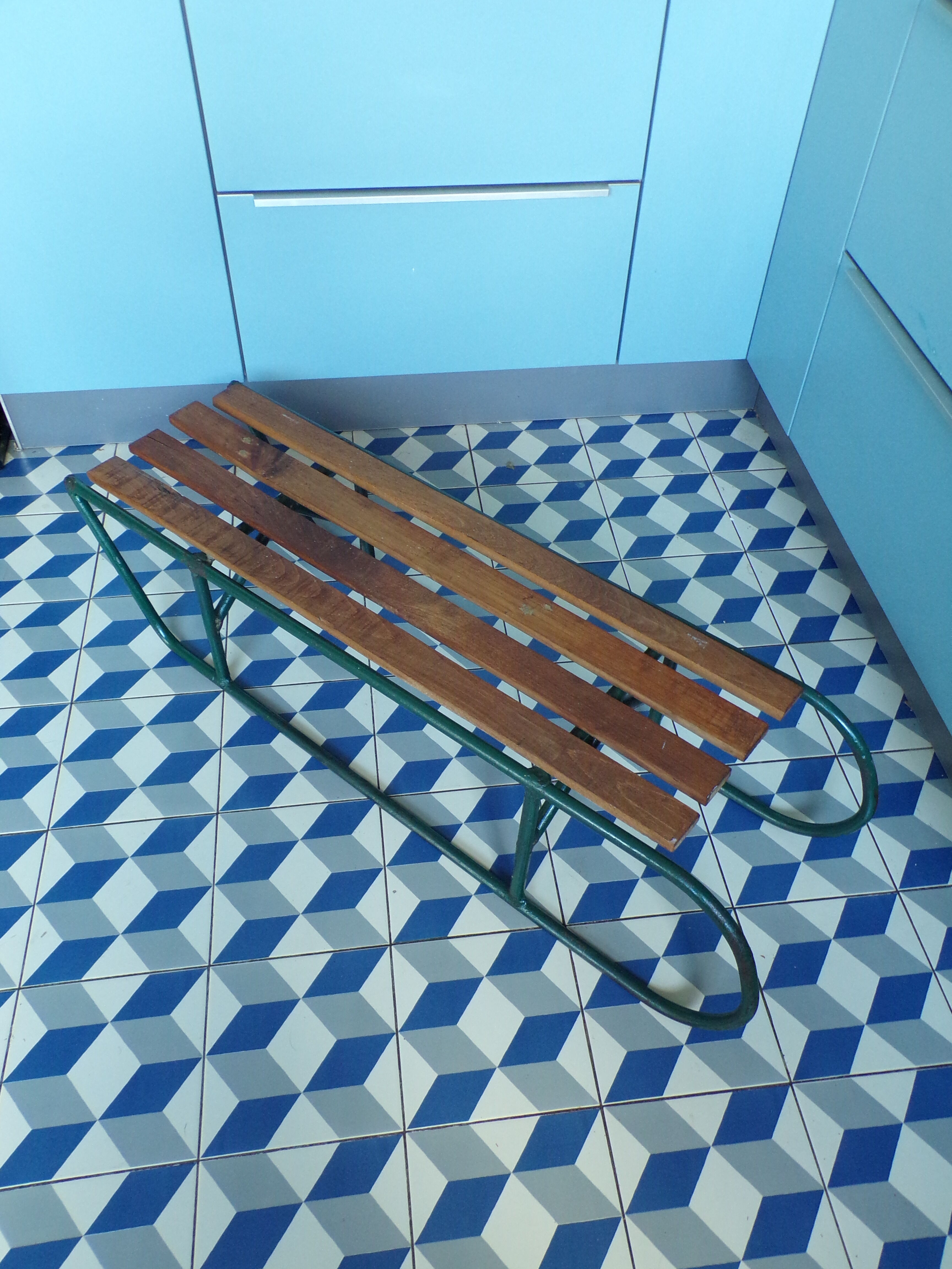 Old sledding iron and wood