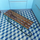 Old sledding iron and wood