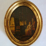 Set of 2 paintings in oval frames