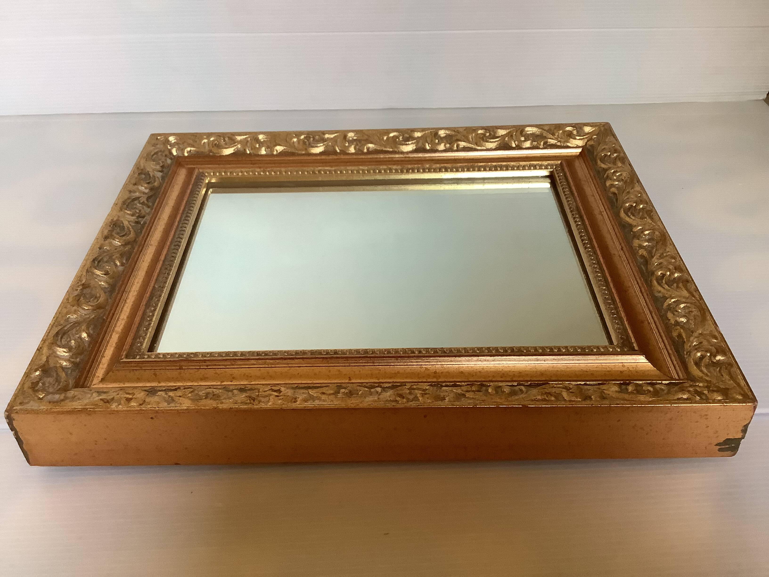 Gilded wooden beaded mirror
