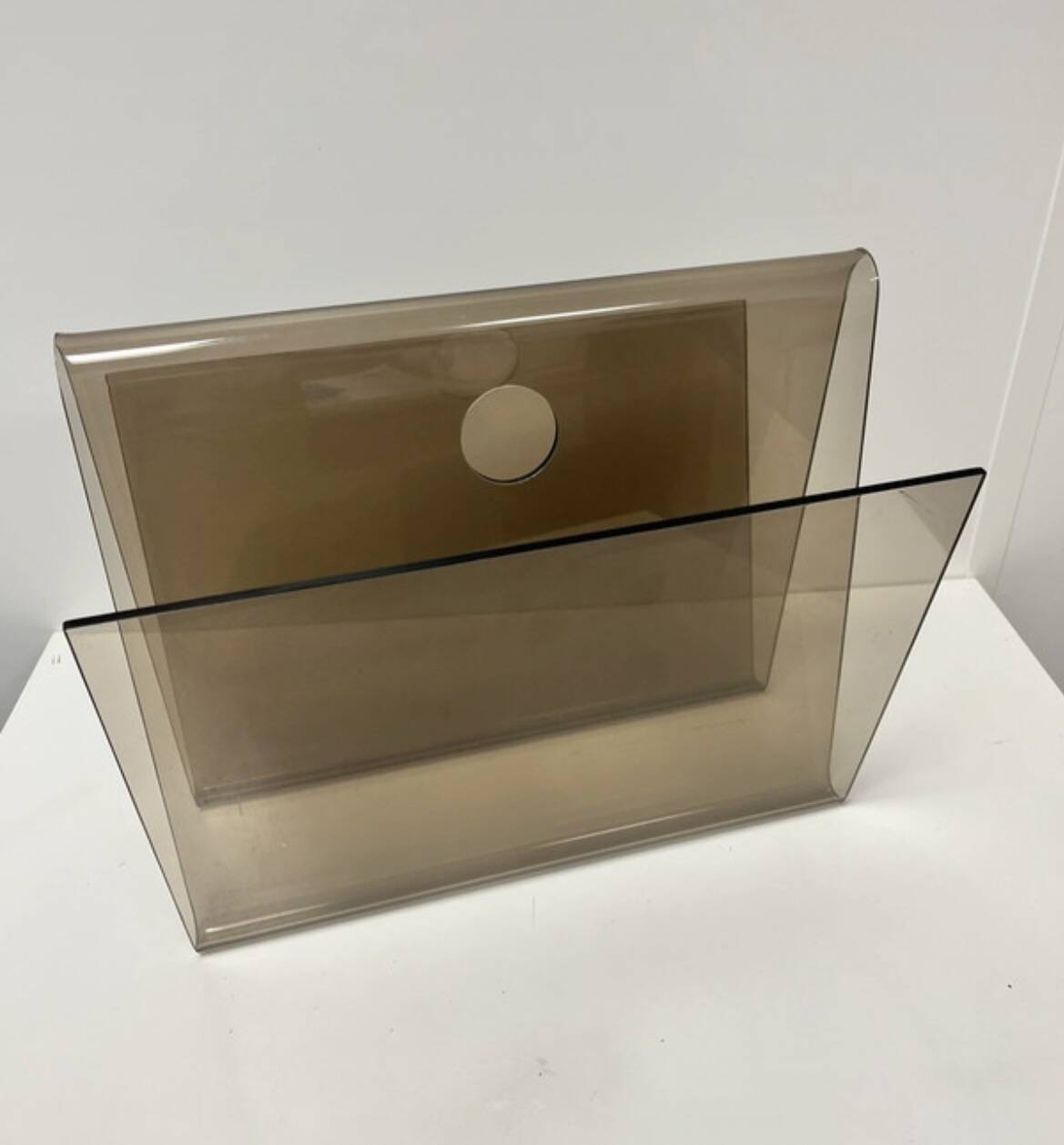 Smoked plexiglass magazine rack in the style of Michel Dumas, France, 1970s.