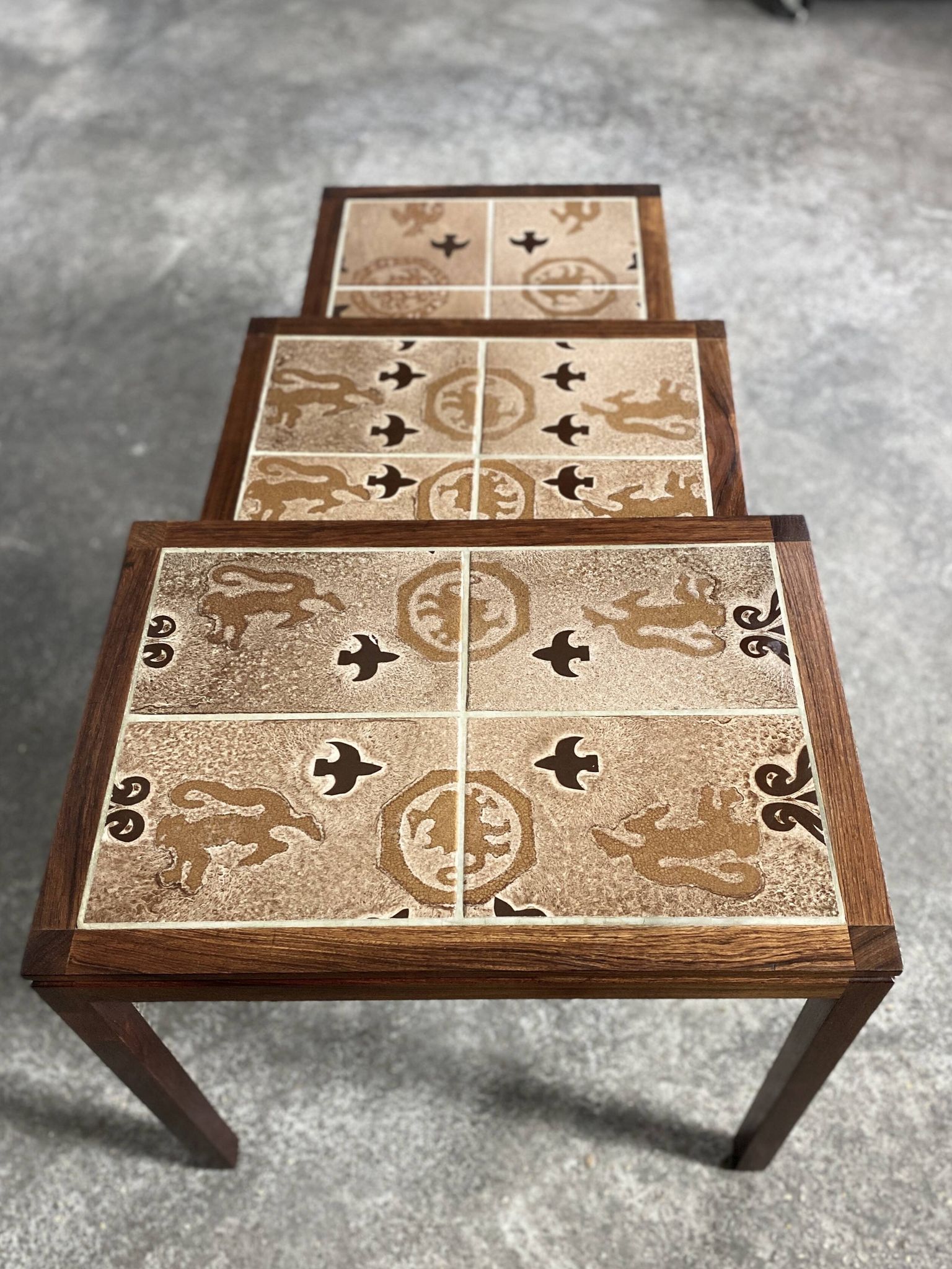 Danish nesting tables in rosewood and ceramic by Willy Ryomgard, Mo.