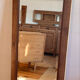 Grand miroir ancien en chêne massif brut et cannage 
