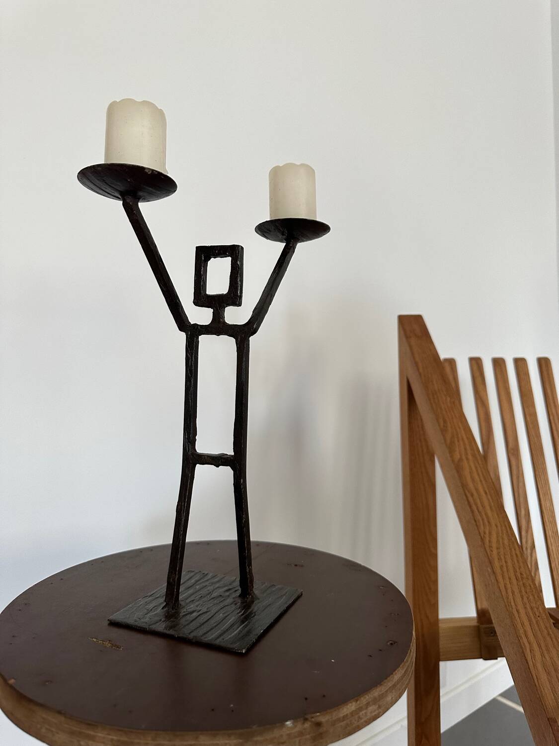 Vintage wrought iron anthropomorphic candle holder