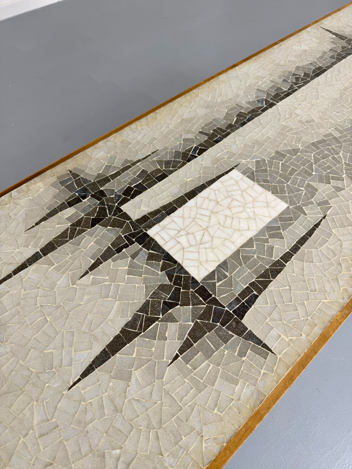 Vintage coffee table with mosaic top, 1960s modernist graphic design.