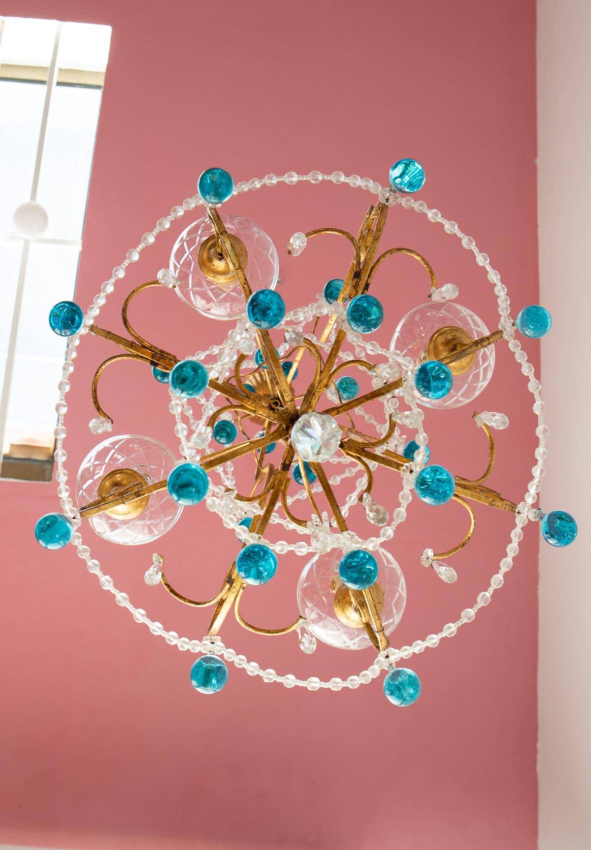Italian chandelier in gold metal and blue crystal drops