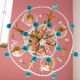 Italian chandelier in gold metal and blue crystal drops