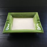 Empty green pocket and ivory