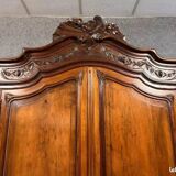 Armoire a coquilles de style Louis XV en acajou vers 1850