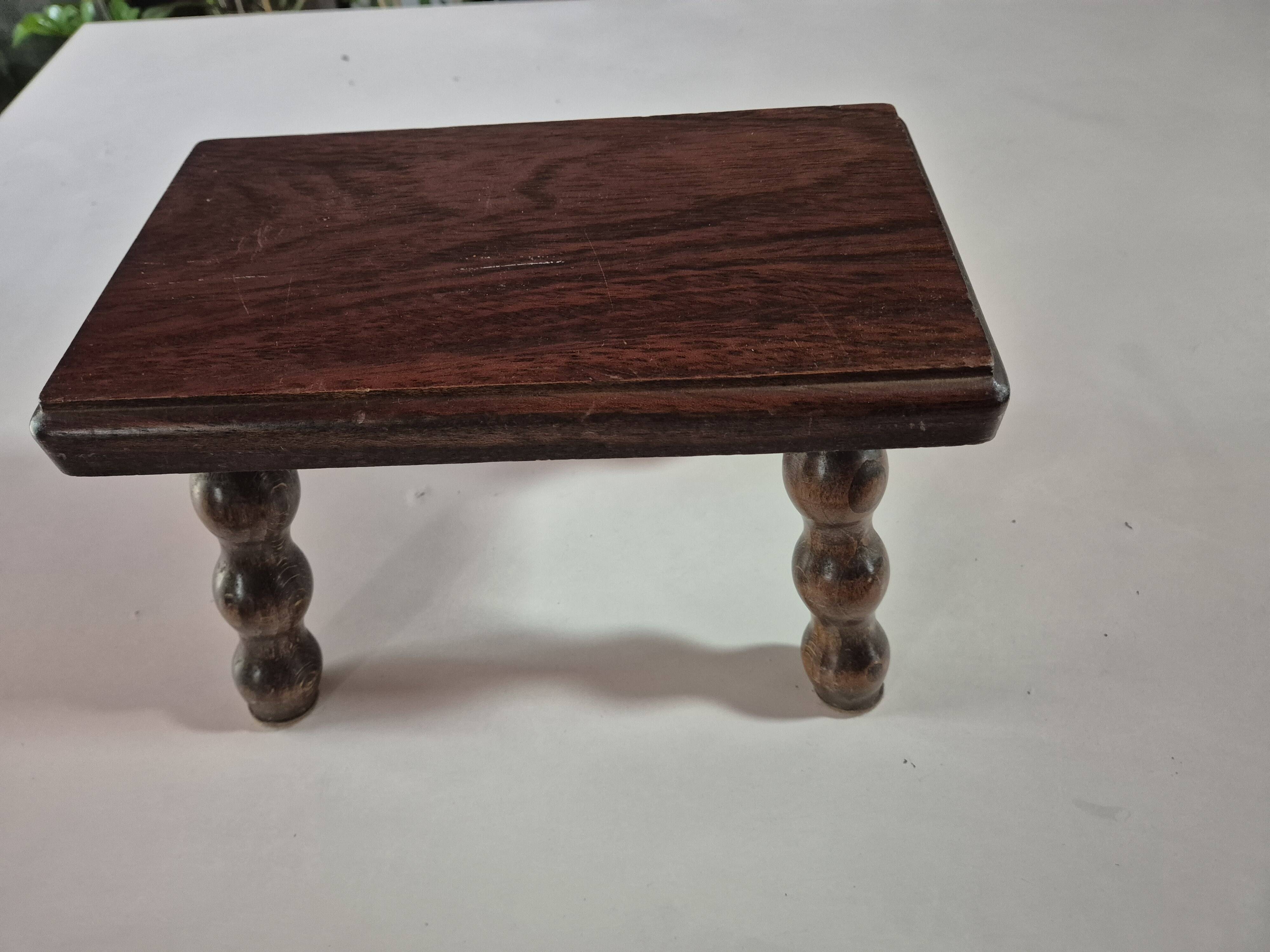 Mini footstool with vintage twisted legs.