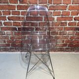 Suite of four plexiglass and metal chairs