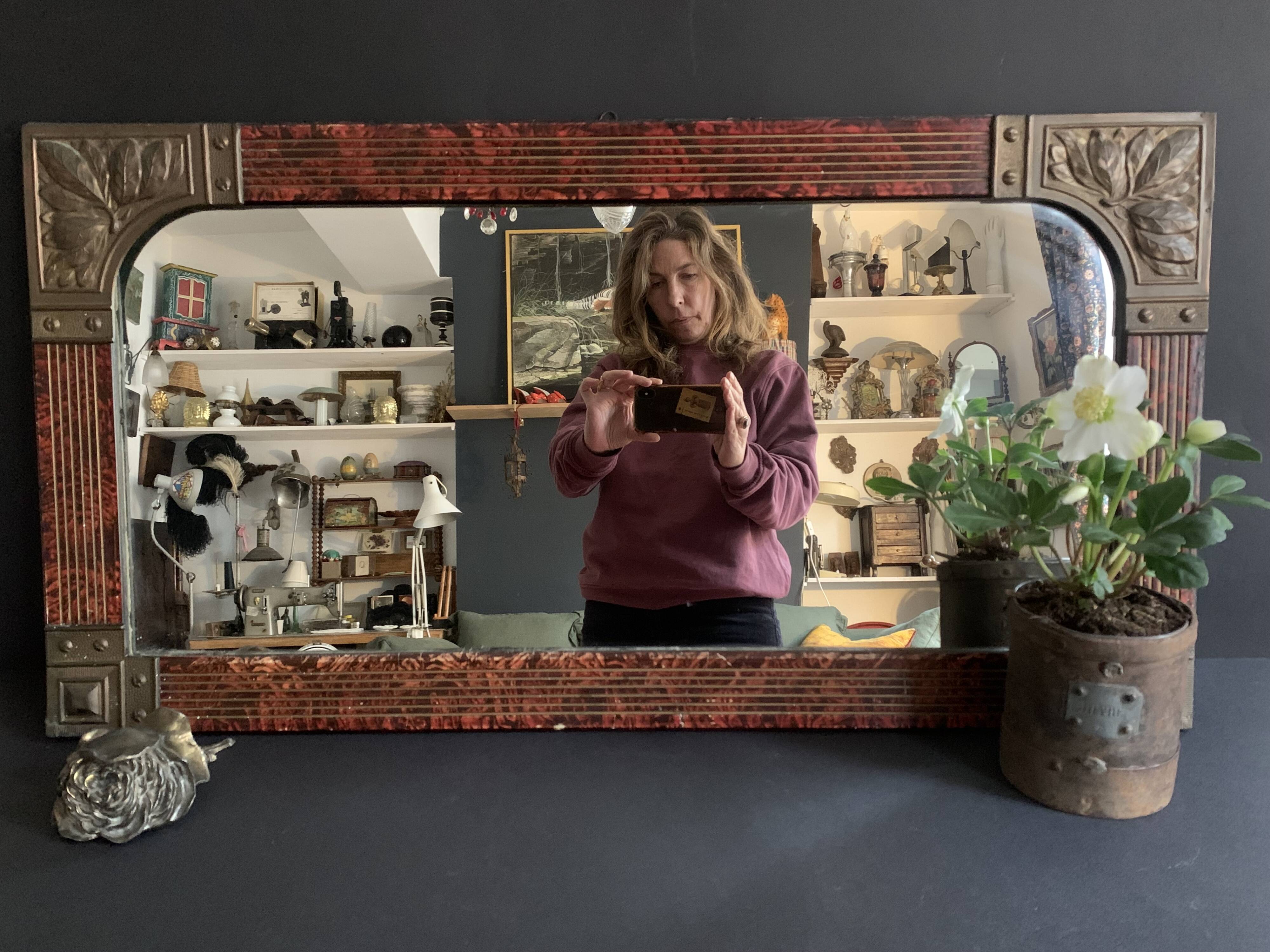 Hand painted art nouveau mirror decorated with chiseled brass, french mercury mirror from the 1920s
