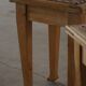 A pair of antique Danish pine stools from the late 19th century.