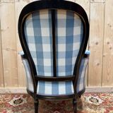 Louis XVI style bergère armchair in blackened wood