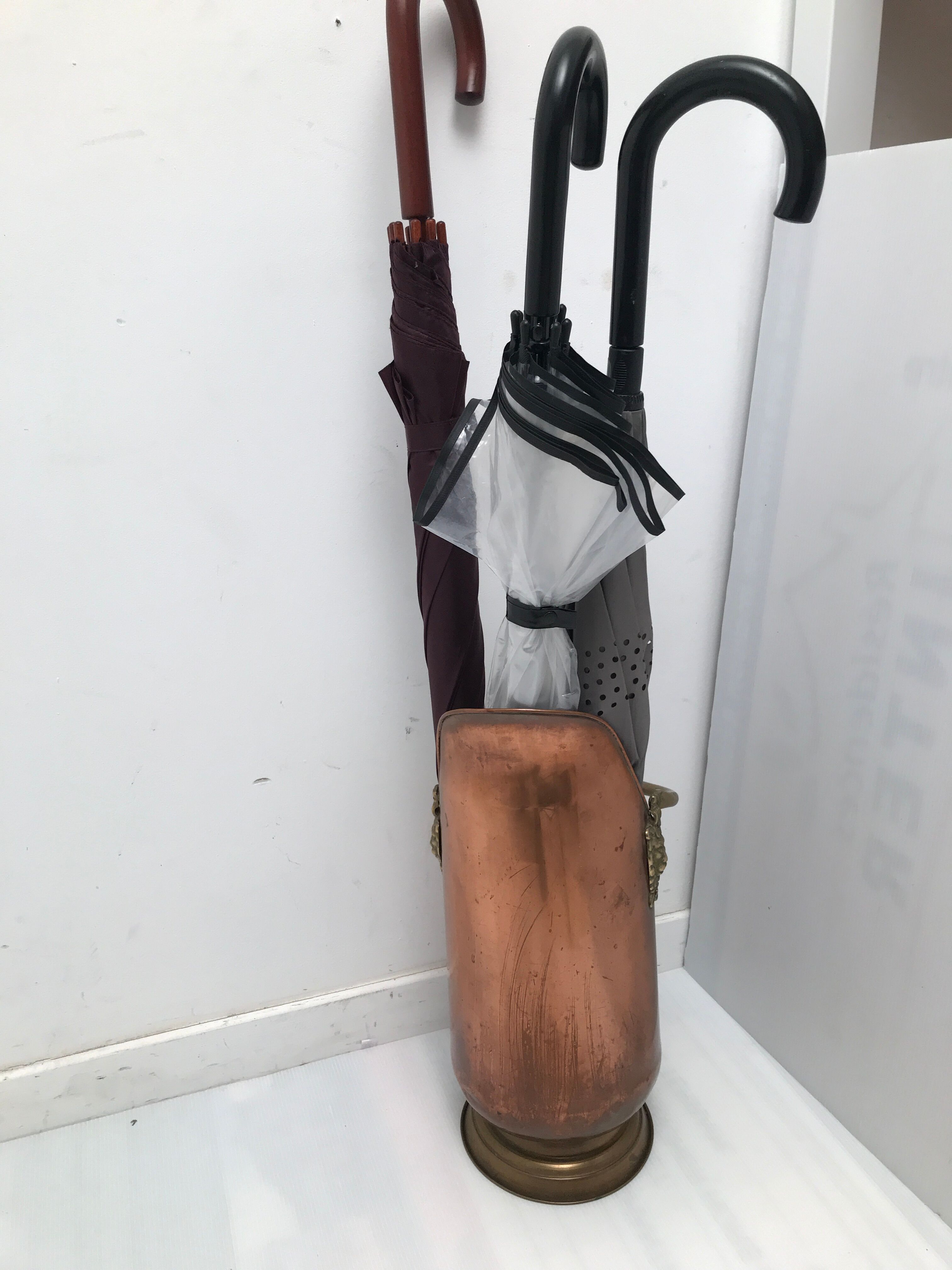 Copper umbrella holder and vintage porcelain handles
