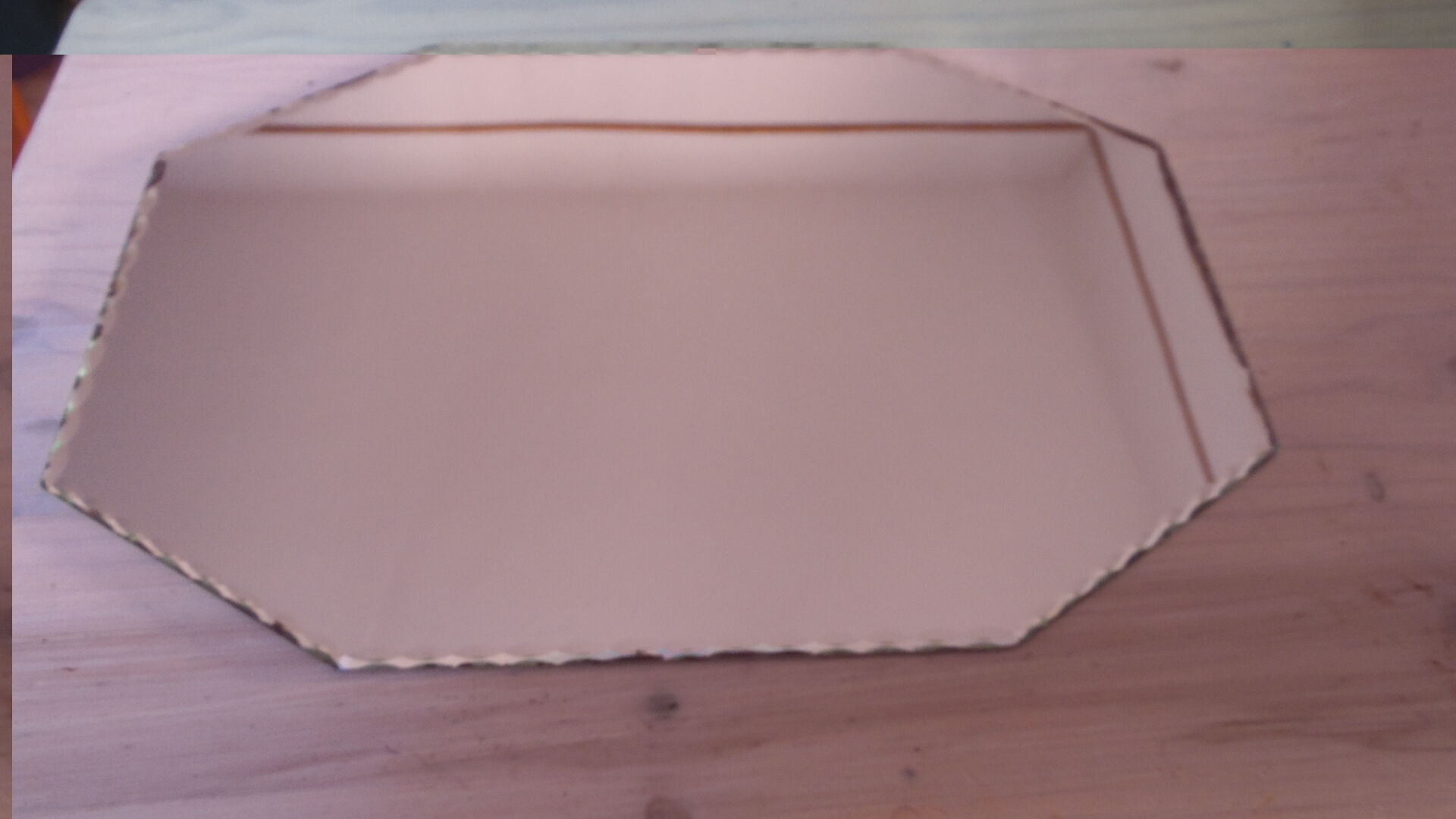 Beveled octagonal table mirror